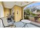 Enjoy a relaxing screened patio equipped with a grill, seating area, and views of the outdoors at 6319 Sunset Bay Cir, Apollo Beach, FL 33572
