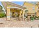 Community pool area featuring a covered seating area and well-maintained landscaping at 6319 Sunset Bay Cir, Apollo Beach, FL 33572