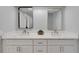 Elegant bathroom vanity featuring double sinks, modern hardware, and stylish mirrors, perfect for a sophisticated touch at 6914 Harbor Dr, Hudson, FL 34667