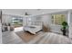 Large, inviting bedroom with neutral decor and great natural light at 6914 Harbor Dr, Hudson, FL 34667