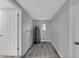 Practical utility room with durable flooring and a water heater, providing functionality and ease at 6914 Harbor Dr, Hudson, FL 34667