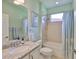 Light and airy bathroom with granite counters and a shower-tub combination at 724 Chipper Dr, Sun City Center, FL 33573