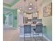 Kitchen features a breakfast bar, stainless appliances, and ample cabinet space at 724 Chipper Dr, Sun City Center, FL 33573