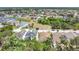 This aerial shot showcases the neighborhood's layout with nearby ponds and the home's position within the community at 7518 Tangle Brook Blvd, Gibsonton, FL 33534