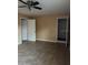 The bedroom includes two entryways and tile flooring at 7605 W Deleon Ct, Tampa, FL 33615