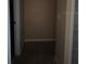The hallway has tile flooring and neutral walls at 7605 W Deleon Ct, Tampa, FL 33615