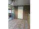 Enclosed patio with tiled flooring and door leading inside at 7605 W Deleon Ct, Tampa, FL 33615