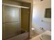 Full bathroom with tub, toilet, vanity, and linoleum floors at 8244 125Th St, Seminole, FL 33772