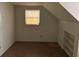 Bedroom with dormer window and built in storage at 8244 125Th St, Seminole, FL 33772