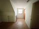Attic bedroom with window and some storage at 8244 125Th St, Seminole, FL 33772
