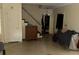 Spacious living room featuring staircase and neutral walls ready for updates at 8244 125Th St, Seminole, FL 33772