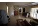Inviting living room featuring staircase and neutral walls ready for updates at 8244 125Th St, Seminole, FL 33772