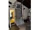 Utility room with water heater, HVAC, and storage at 8244 125Th St, Seminole, FL 33772