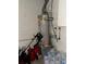 Water heater set in the corner of a basement at 8244 125Th St, Seminole, FL 33772