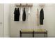Walk-in closet with wire shelving, clothing rack, and a woven bench for easy storage at 8445 Sea Ray Run, Parrish, FL 34219