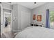 Clean bedroom showcases a neutral color palette, closet, and a tranquil ambiance at 1002 Cavour Ct, Brandon, FL 33511