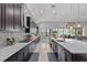 Bright kitchen with granite countertops, tile backsplash, and modern stainless steel appliances at 1002 Cavour Ct, Brandon, FL 33511