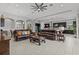 Expansive living room seamlessly blends with a modern kitchen, creating an inviting and spacious atmosphere at 1002 Cavour Ct, Brandon, FL 33511