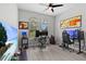 Bright home office with dual desk setups, large windows, and modern decor at 1002 Cavour Ct, Brandon, FL 33511