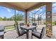Paver patio area with a dining table and outdoor seating at 1002 Cavour Ct, Brandon, FL 33511