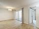 Dining room featuring a modern light fixture and sliding doors to a screened in patio at 1041 Bowsprit Ln # 1041, Holiday, FL 34691