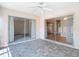 Lanai with tile floor and multiple sliding glass door entrances to rooms at 1041 Bowsprit Ln # 1041, Holiday, FL 34691