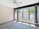 Enjoy the lanai with neutral tile floors and large windows with a beautiful view at 1041 Bowsprit Ln # 1041, Holiday, FL 34691