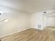 Spacious and well-lit living room with neutral walls and modern flooring at 1041 Bowsprit Ln # 1041, Holiday, FL 34691