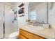 Bright bathroom with shower and tub combo and vanity at 10739 Shady Preserve Dr, Riverview, FL 33579