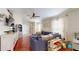 Comfortable living space with a large sectional sofa and well-lit, open floor plan at 10739 Shady Preserve Dr, Riverview, FL 33579