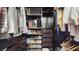 Walk-in closet featuring closet organization system for clothing and shoes at 10739 Shady Preserve Dr, Riverview, FL 33579