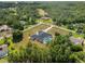 An impressive property featuring a private pool, spacious yard, and lush surrounding greenery at 11137 Woodland Waters Blvd, Weeki Wachee, FL 34613