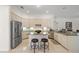 Bright eat-in kitchen featuring a large island and stainless steel appliances at 11137 Woodland Waters Blvd, Weeki Wachee, FL 34613