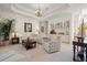 Spacious living room with wet bar, coffered ceilings, and decorative furnishings at 11137 Woodland Waters Blvd, Weeki Wachee, FL 34613