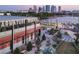Aerial view of Armature Works building with outdoor seating and riverfront scenery at 112 W Mohawk Ave, Tampa, FL 33604