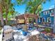 Outdoor patio with seating and grill at 112 W Mohawk Ave, Tampa, FL 33604