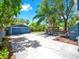 View of home's garage and driveway at 112 W Mohawk Ave, Tampa, FL 33604