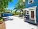 View of home's exterior, patio and garage at 112 W Mohawk Ave, Tampa, FL 33604
