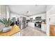 Bright kitchen features stainless steel appliances, granite countertops, and modern tiling at 112 W Mohawk Ave, Tampa, FL 33604