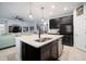 Bright kitchen with an island, stainless steel appliances, and an open layout at 11550 Lake Lucaya Dr, Riverview, FL 33579