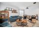 Stylish living room featuring modern furniture, decor, and bright natural light at 11550 Lake Lucaya Dr, Riverview, FL 33579