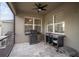Outdoor patio featuring a built-in BBQ grill, countertop space and tiled flooring providing an ideal space for cooking at 11550 Lake Lucaya Dr, Riverview, FL 33579