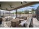 Relaxing screened lanai offering comfortable seating, a dining table, and access to the refreshing pool for leisure at 11550 Lake Lucaya Dr, Riverview, FL 33579