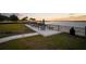 Outdoor patio area with seating overlooking a tranquil lake view, perfect for relaxing evenings at 11550 Lake Lucaya Dr, Riverview, FL 33579