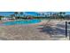 Stunning community pool area with ample seating, shaded gazebos, and mature landscaping, offering a resort-like experience at 11567 Weston Course Loop, Riverview, FL 33579
