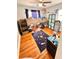 Bedroom featuring hardwood floors, ceiling fan, and fun space decor for the creative mind at 1233 Belleair Rd, Clearwater, FL 33756