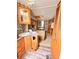 Relaxing bedroom features a sink, overhead storage, and access to an ensuite bathroom at 1233 Belleair Rd, Clearwater, FL 33756