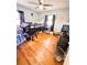 Bedroom with wooden floors and bunk bed for a unique and elevated sleeping experience at 1233 Belleair Rd, Clearwater, FL 33756