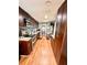 Well-equipped kitchen featuring stainless steel appliances, granite countertops, and dark wood cabinetry at 1233 Belleair Rd, Clearwater, FL 33756