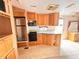 The RV kitchen features stainless steel appliances, oak cabinets, and a double sink at 1233 Belleair Rd, Clearwater, FL 33756